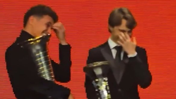 Zak Brown's speech in front of his McLaren team goes viral as he celebrates winning both 2025 championship trophies.