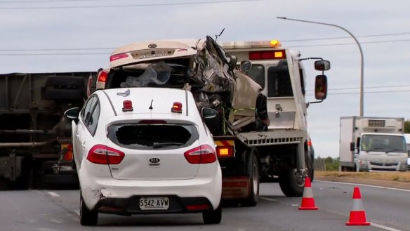 Two men were forced to jump clear of a truck that ploughed towards them in Adelaide.