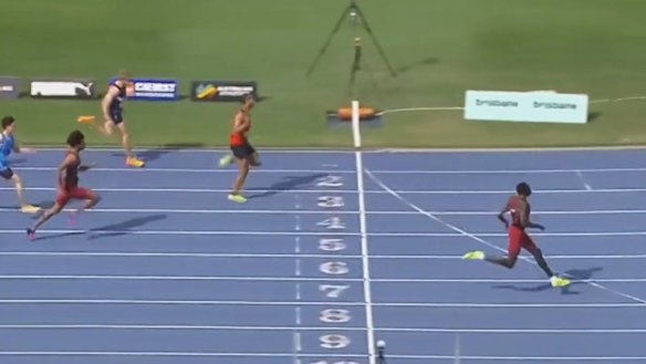Sprint sensation Gout Gout breezes through his heat of the under-20 100 metres at the Australian athletics junior championships in Brisbane.