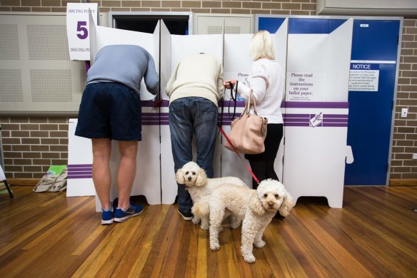 Low on trust: people vote during the 2016 Australian federal election.