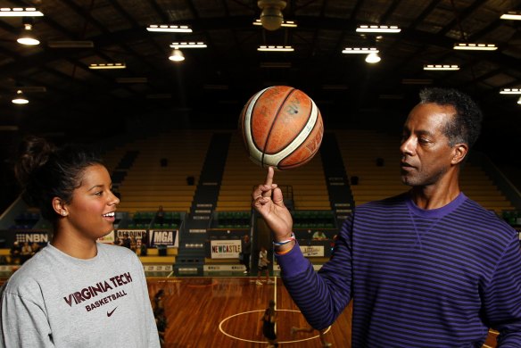 Hannah Young with her father Lewis Young, a former professional basketball player and Harlem Globetrotter, in 2012.