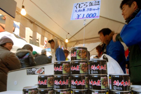 A fish market in Tokyo displaying canned whale meat cooked with soy sauce and sugar.