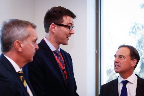 Dr Bastian Seidel (centre), pictured here with Health Minister Greg Hunt (right) in May 2017.