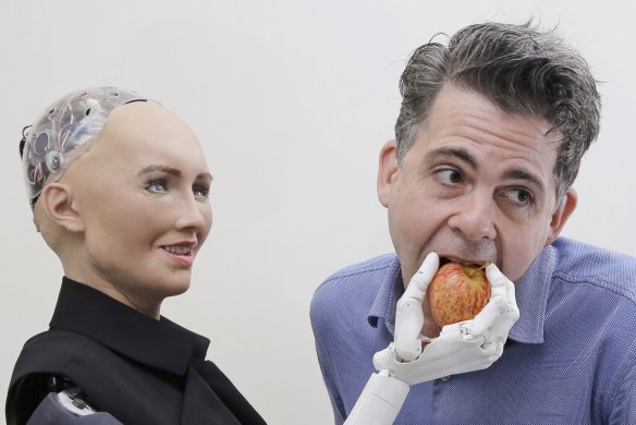 Sophia, a lifelike robot at the forefront of artificial intelligence, with its creator David Hanson.