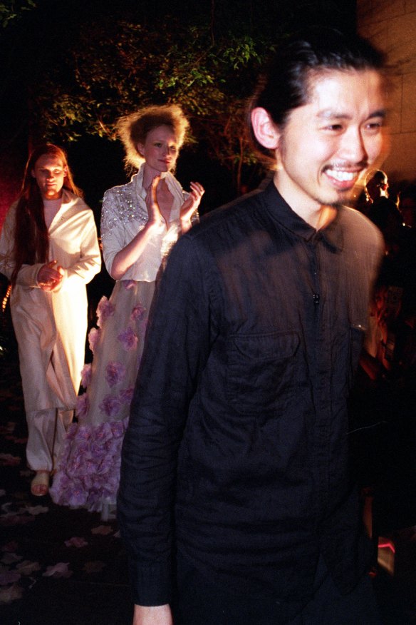 Isogawa with a "bridal" couple at a parade in Sydney, 2000. 