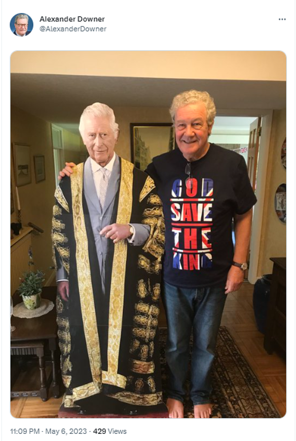 Alexander Downer with a cut-out of King Charles III.