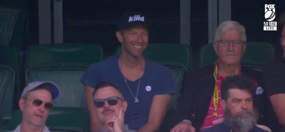 Coldplay singer Chris Martin and his dad watch Australia take on Pakistan at the MCG.