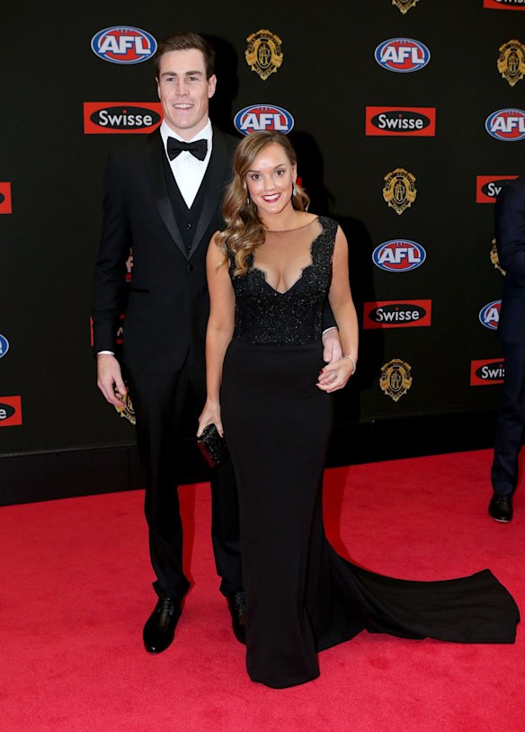 GWS footballer Jeremy Cameron poses for a photo with his partner Claire Levy  on the red carpet ahead of the 2015 AFL Brownlow Medal count at Crown Palladium.