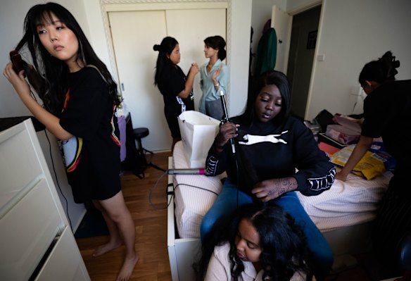 Blacktown Girls High School students prepping. "There was about six or seven us – We had Angela, she was doing everyone’s make up. A few other girls came an hour later and all did their hair and makeup together. As soon as the hour hit to go, we started cramming in the bus and getting ready." says Nashita.