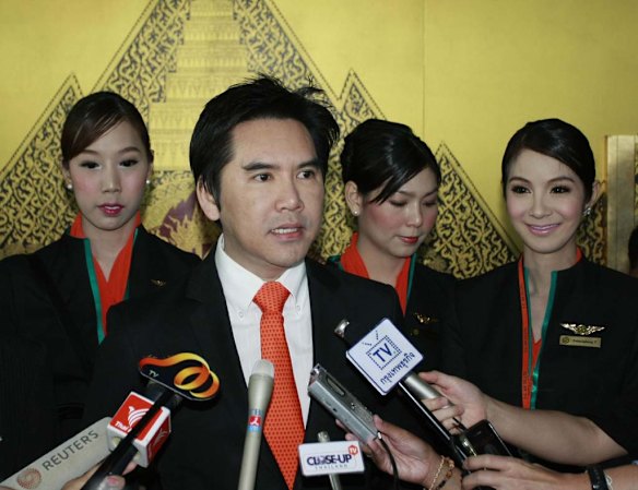 Peter Chan, President of PC Air, talks with reporters about his airline.