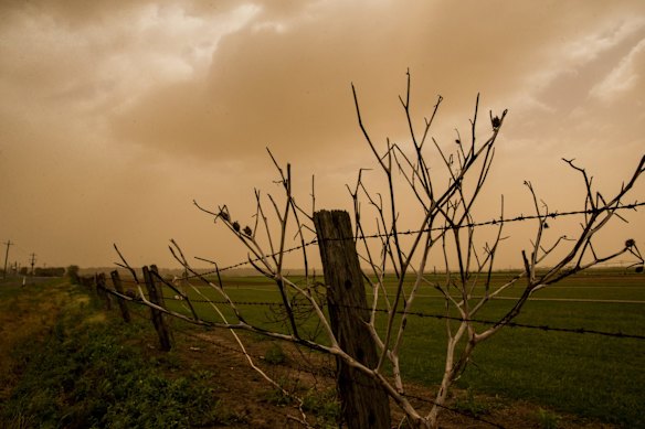 Strong winds move dust clouds from the west across Richmond towards the coast. 