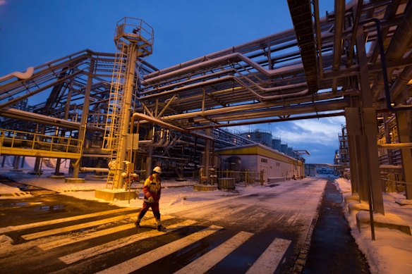 An employee uses a pedestrian crossing outside the Royal Dutch Shell Plc lubricants blending plant in Torzhok, Russia.