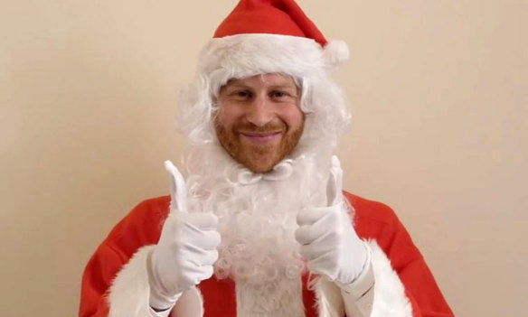 In a video, Prince Harry sends festive wishes to nearly 200 children at a party put on by the Scotty's Little Soldiers charity.