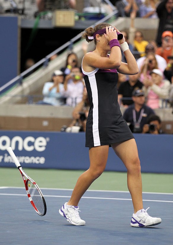Samantha Stosur of Australia celebrates after beating Serena Williamsto win the US Open women's singles title.