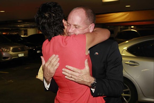 Campbell Newman arrives at the Hilton Hotel with his wife Lisa.