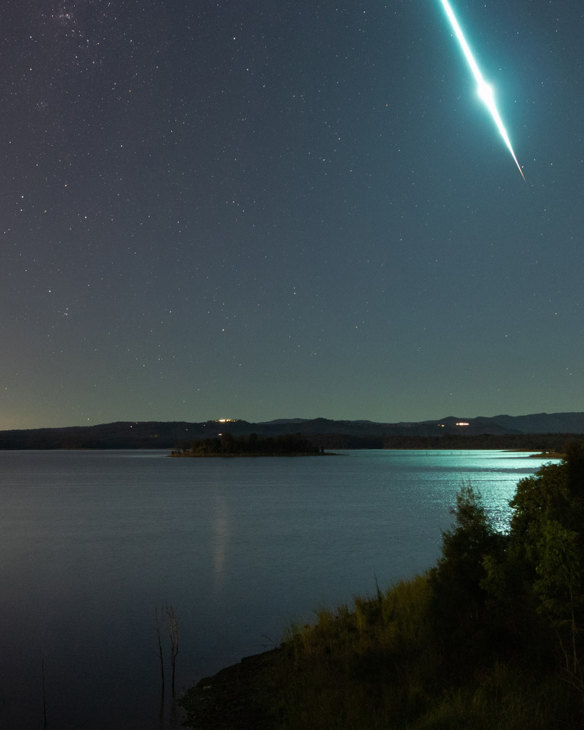A meteor is seen over North Pine Dam in south-east Queensland.