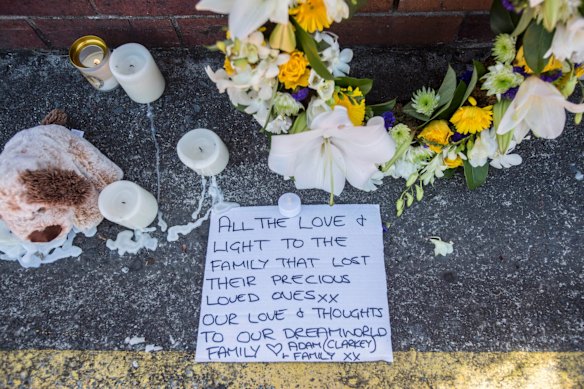 Flower tributes at Dreamworld where four people died after a malfunction with the 'Thunder River Rapids' at the theme park.