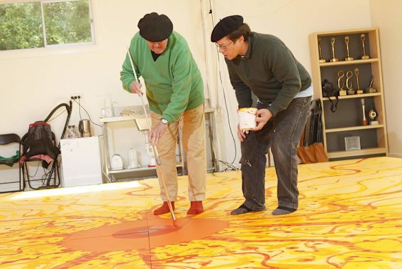 John Olsen, AO, and assistant Carlos Barrios.