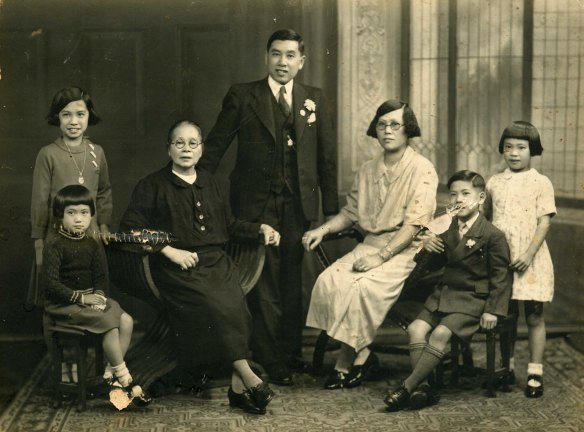 Elizabeth Chong, aged six, (sitting far left) with her grandmother, parents and older siblings.