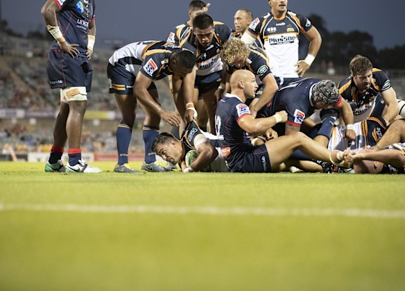 The Brumbies' Rory Arnold scores a try in the first half. 