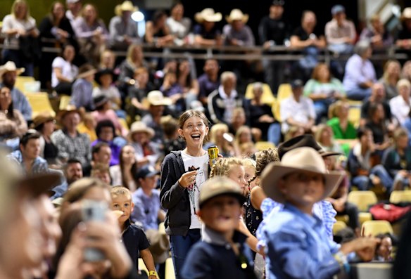 Children and other spectators enjoy entertainment at the Mount Isa Mines Rodeo.