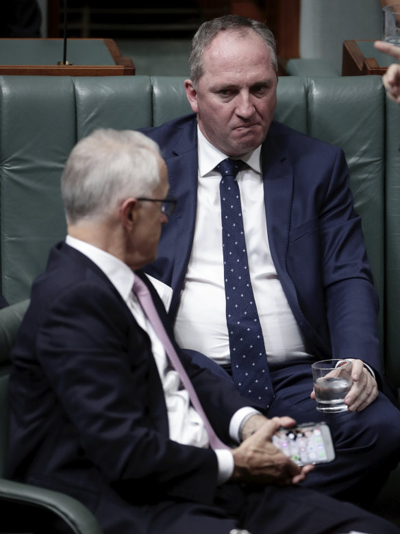 February 14, 2018: Barnaby Joyce glances at Malcolm Turnbull during Question Time.