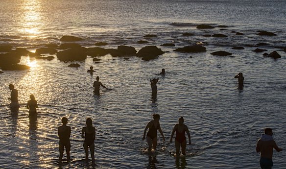 More people than usual take a dip at Bronte Beach during Sydney lockdown.