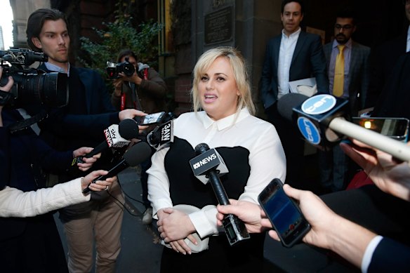 Rebel Wilson talks to the media outside the Supreme Court on Tuesday.