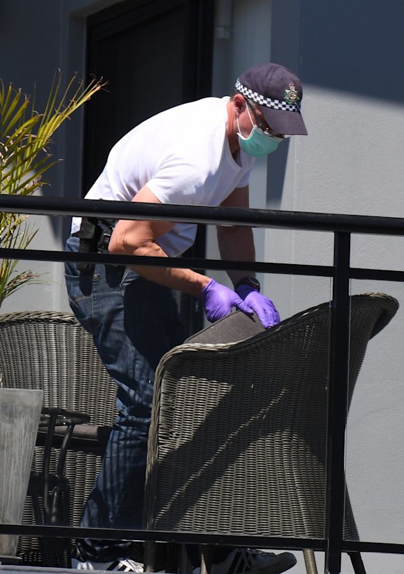 Police forensic officers at the house in Merrylands.