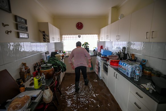 Floodwatter starts to come into the kitchen.
