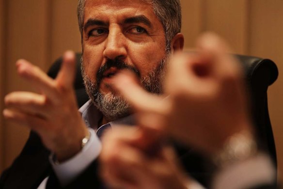 Khalid Mishal in discussion during a meeting at a house in Doha, Qatar.