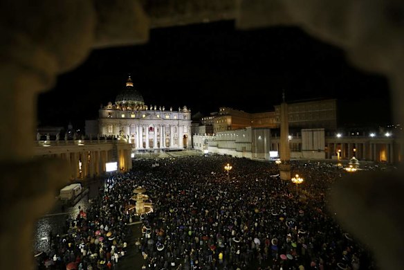 Faithful on St.Peter's Square cheer after white smoke rose from the chimney above the Sistine Chapel.