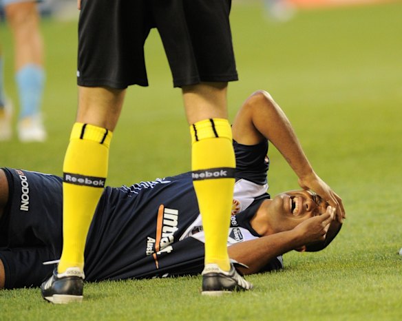Agony: Suffering a serious leg injury in the A-League grand final against Sydney FC at Etihad Stadium in 2010.