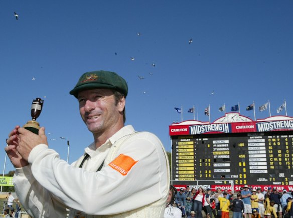 Australian captain Steve Waugh holds the famous Ashes urn aloft at the WACA ground in Perth in 2012.