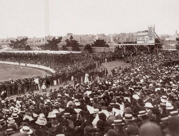 Australia are 8 for 464, with Syd Gregory on 148 and Blackham on 21. Behind the scoreboard, you can see the tower of Paddington Town Hall. Gregory scored 201 of Australia’s first-innings total 586.