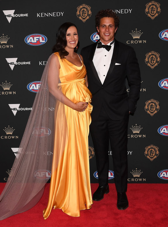 Ed Curnow of the Blues and Emily Curnow arrive