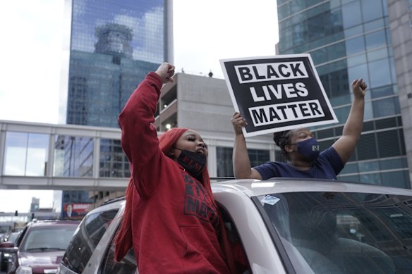 People cheer after a guilty verdict was announced at the trial of former Minneapolis police Officer Derek Chauvin for the 2020 death of George Floyd.