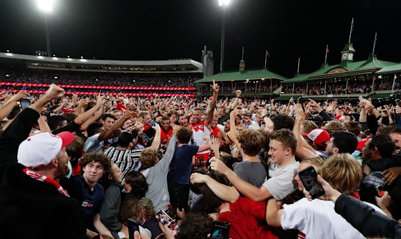 Fans celebrate with Lance Franklin.
