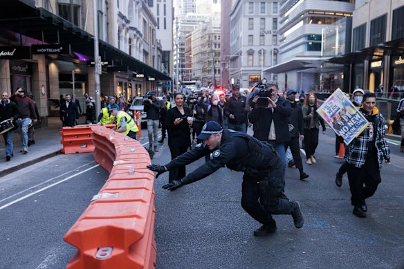 Protestors stopped traffic as they moved around the city, using bollards, chairs and construction material to block the roads. 