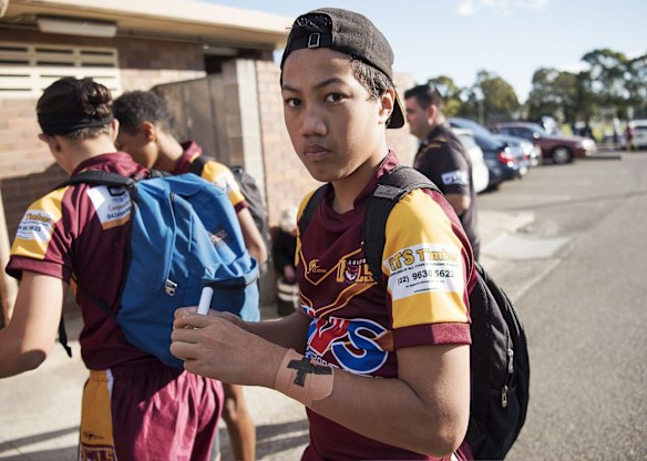 An Owls player heads to the field before their game against Cabramatta.