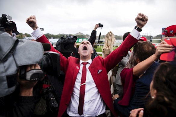 Punters celebrate Redzel winning the TAB Everest horse race held at Royal Randwick Racecourse.