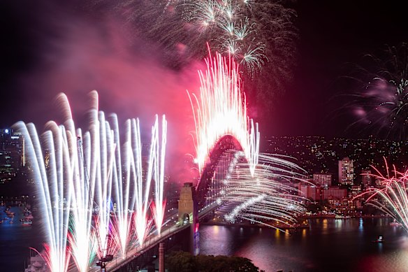 At midnight, a colourful display with bursts of neon, pastel and spinning fireworks blast into the sky to a soundtrack created by electronic music duo The Presets.
