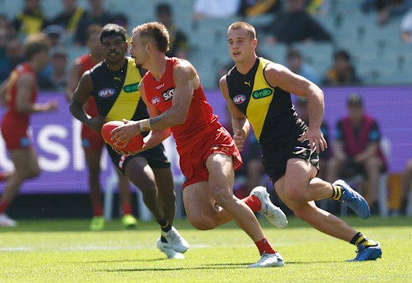 Busy day: The Suns and Tigers go at it at the MCG.