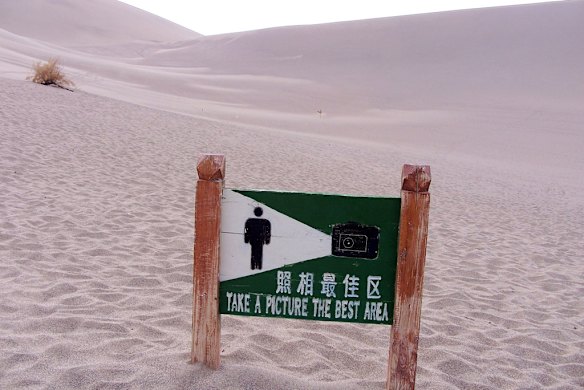 Photographic advice awaits those who visit the dunes near Crescent Lake. Photo: Conrad Walters.