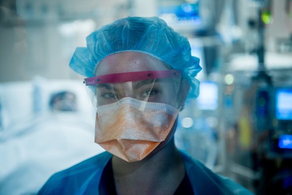 Steph Lord ICU nurse in isolation treating a coronavirus patient.