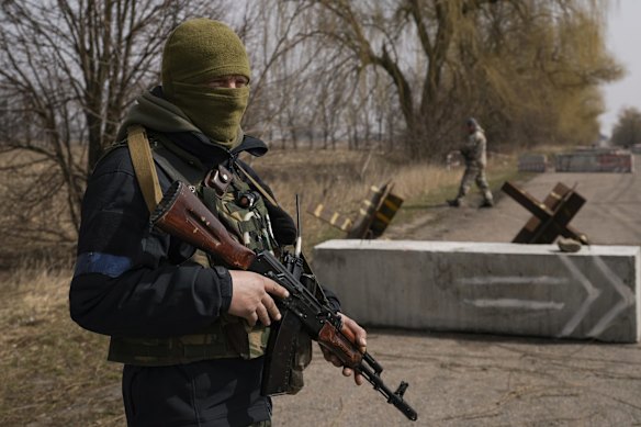 Members of the territorial defense man a checkpoint outside Brovary.