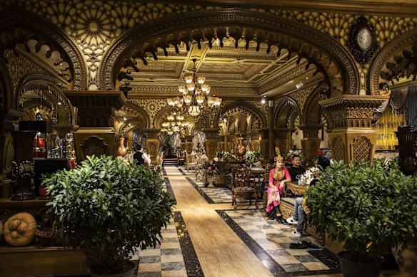 People sit inside a restaurant in Kashgar, Xinjiang autonomous region, China.