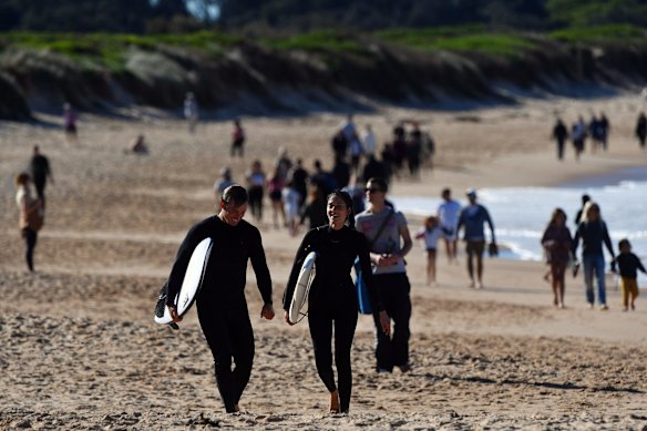 A busier than usual Dee Why Beach in the middle of winter on Sunday. 
