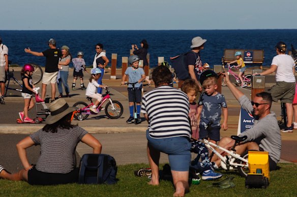 People flocked to a Clovelly beach carpark defying lockdown laws and social distancing recommendations.