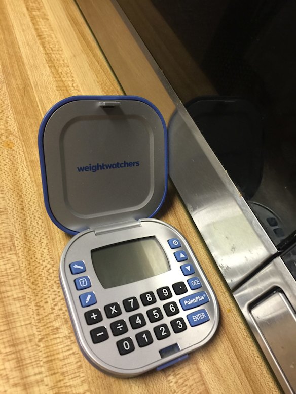 A Weight Watchers calculator left open for use.